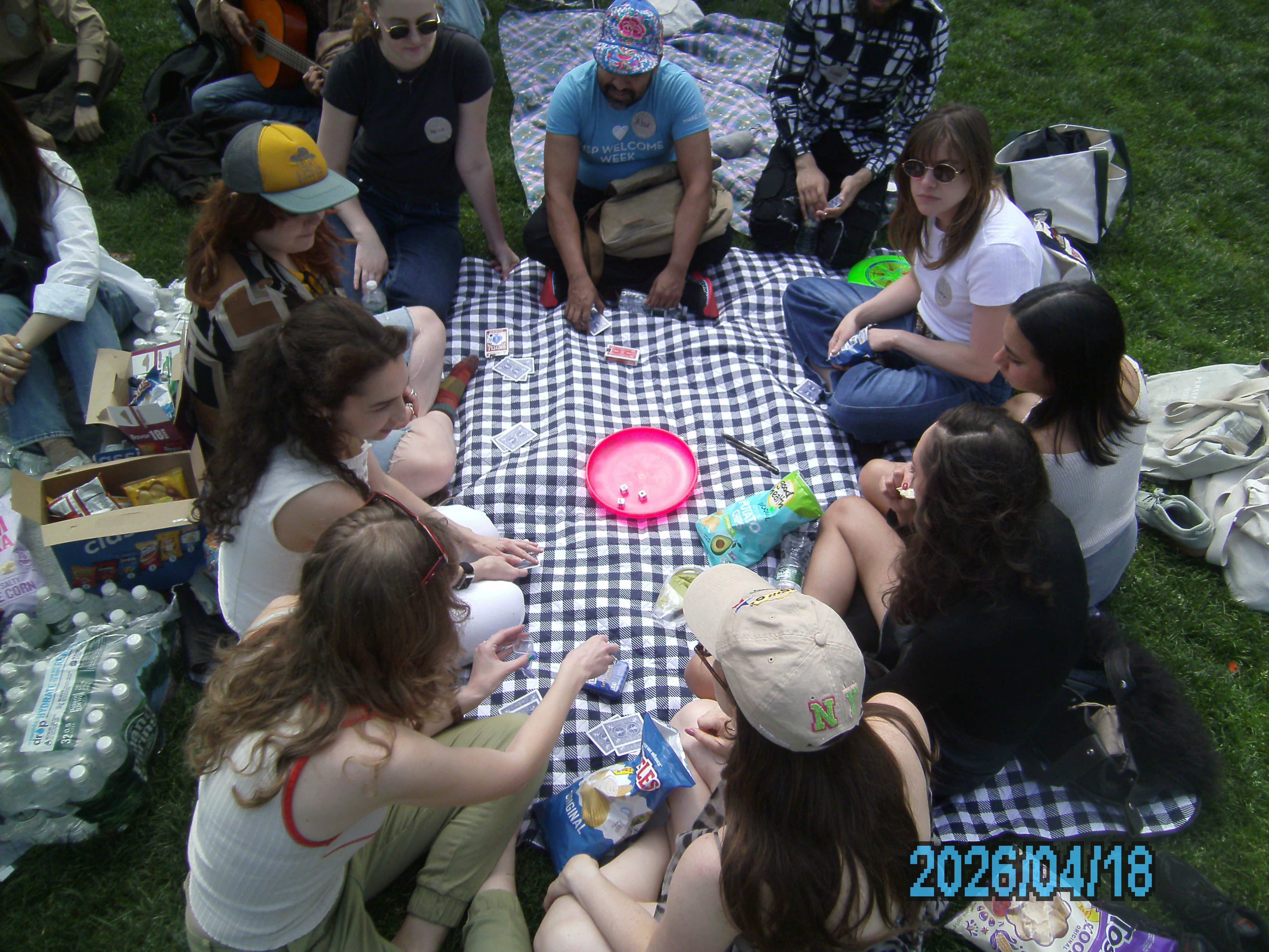 Members hanging out in the park between events